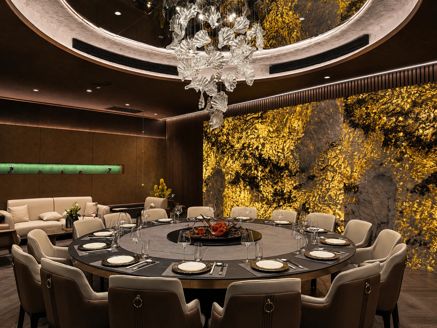 Main dining room in Silverwater — dramatic gold-and-black feature wall and a cascading glass-leaf chandelier over a large round table